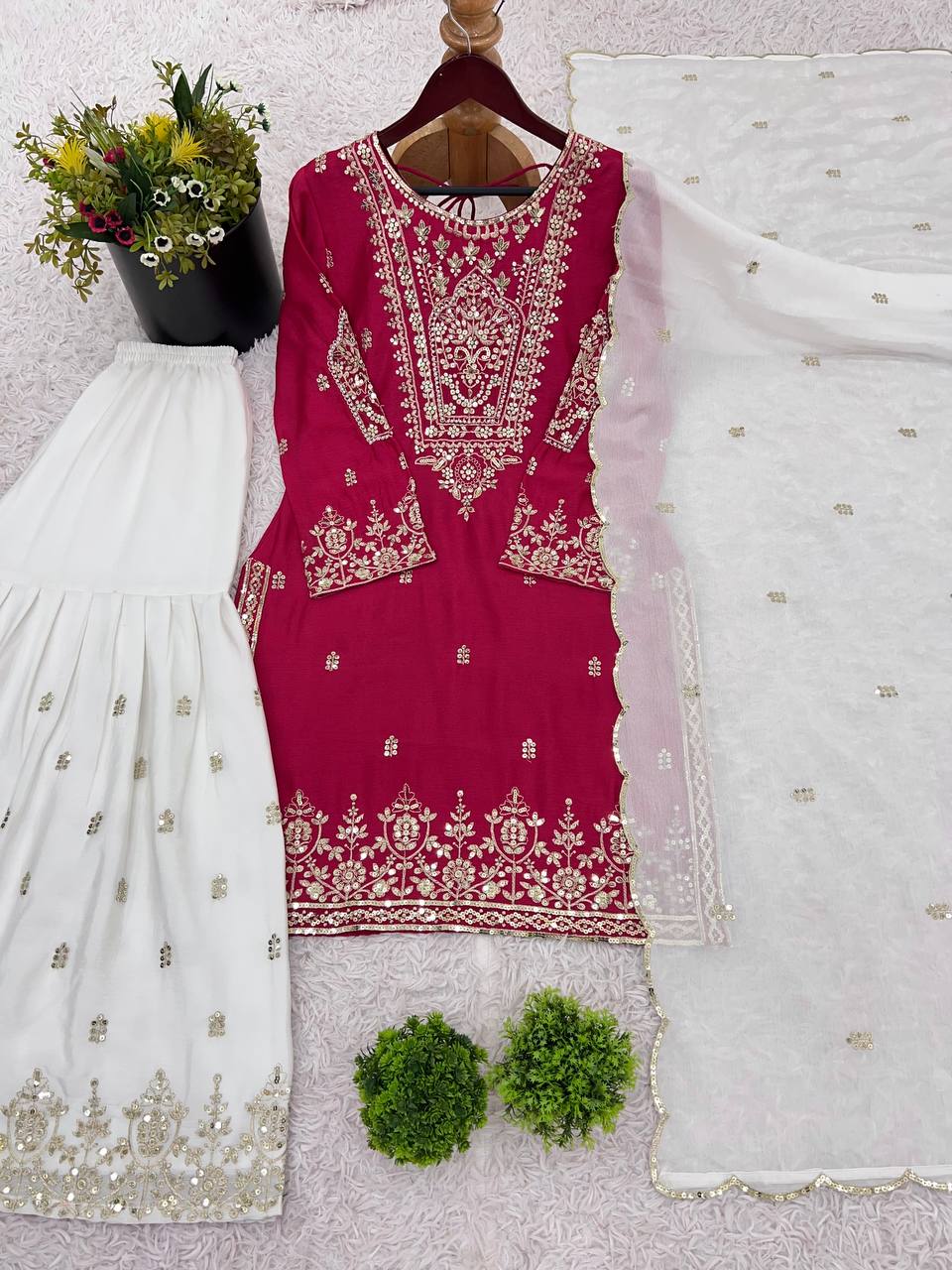 Flattering Embroidery Work Pink Color Sharara Suit