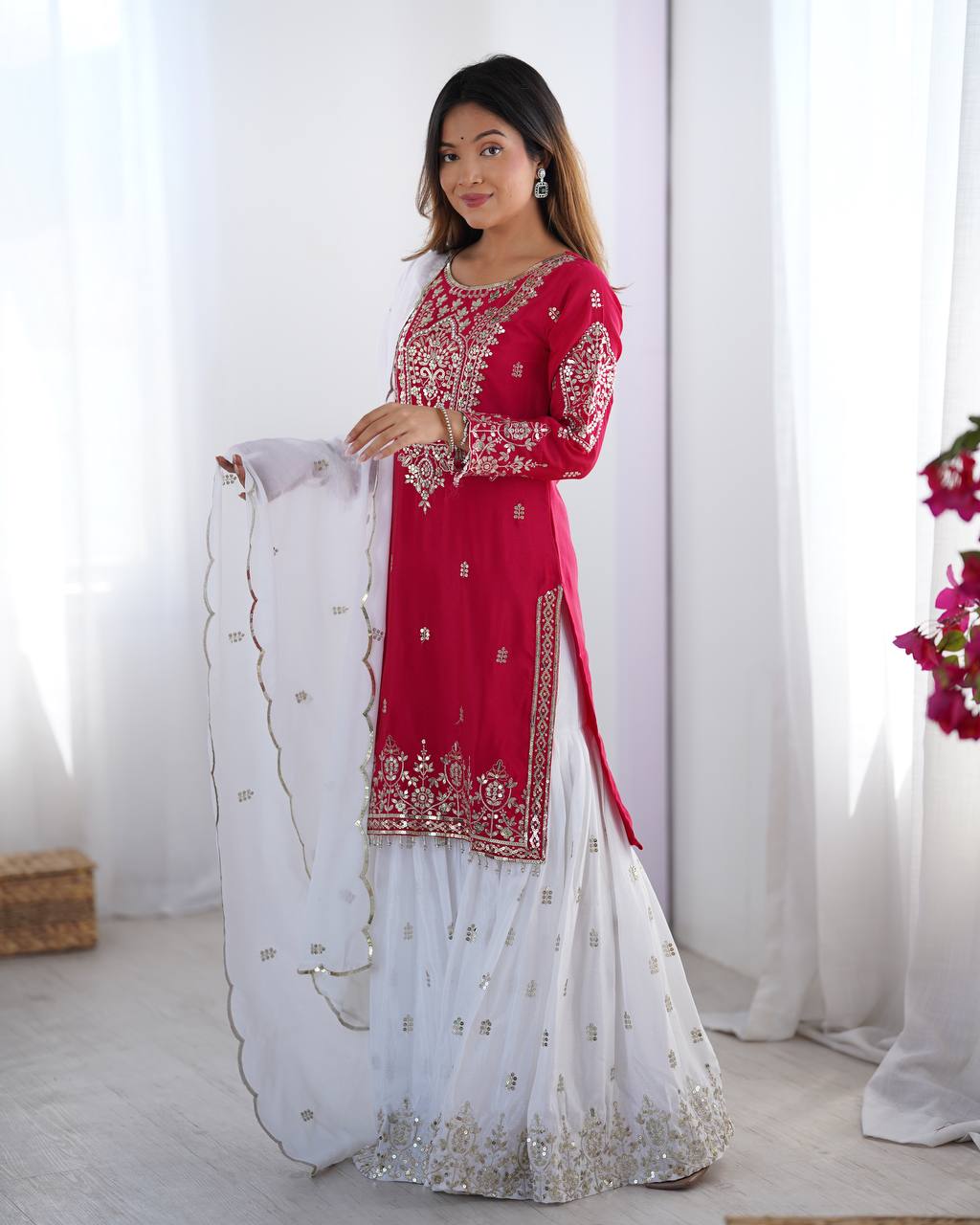 Flattering Embroidery Work Pink Color Sharara Suit